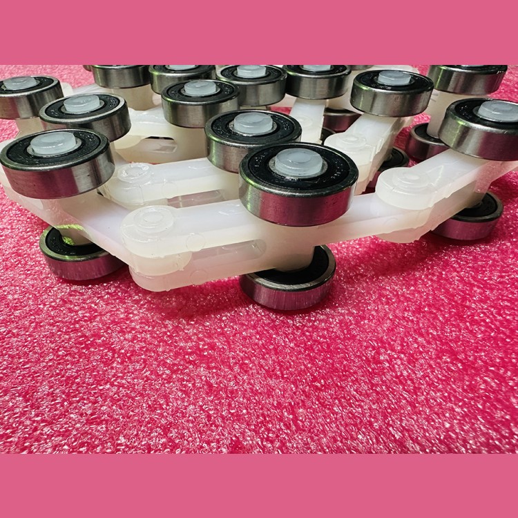 Цепь огибающая баллюстрады поручня эскалатора L=1320мм P=60мм 22 пары роликов BLT Canny Schindler Sigma Otis Latres