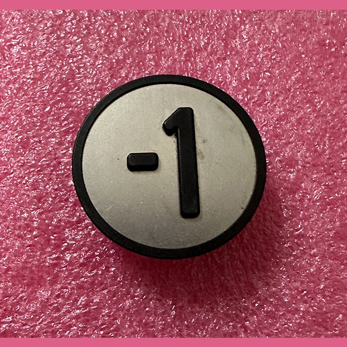 Толкатель кнопочного модуля (накладка) "-1" черный KM801054G071 Kone